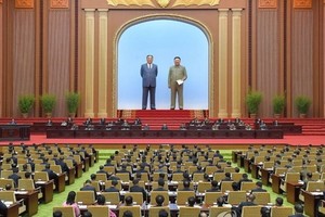 朝鮮第十四屆最高人民會議第五次會議第一天會議28日在平壤萬壽台議事堂舉行。（圖源：朝中社）
