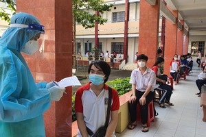 平陽省開始為學生接種新冠疫苗。（圖源：越通社）