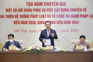 國會主席王廷惠（中）在座談會上發表講話。（圖源：寶珍）