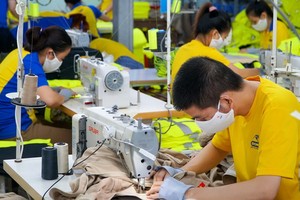 製衣廠生產車間一隅。（圖源：黎南）