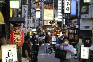 日本為外籍商人和留學生放寬入境。圖為東京街頭一景。（圖源：共同和）