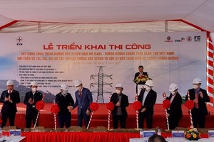 老撾南模-越南襄陽220千伏輸電項目舉行動工儀式。（圖源: Q.Đ）
