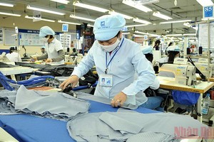 越南生產紡織品成衣出口。（圖源：玉梅）