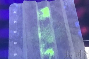 日本研發黑光燈照射測新冠病毒口罩
