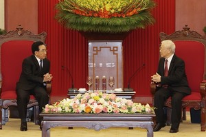 黨中央總書記阮富仲接見潘坎‧維帕萬總理。（圖：互聯網）