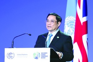 越南政府總理范明政出席COP26峰會議並發表講話。