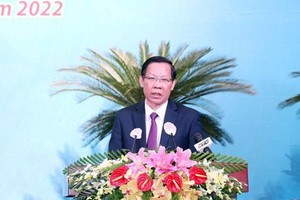 市人委會主席潘文邁在見面會上發表講話。（圖：越通社）