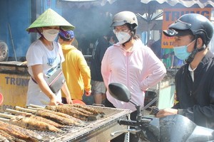 地主誕水果和烤魚生意紅火