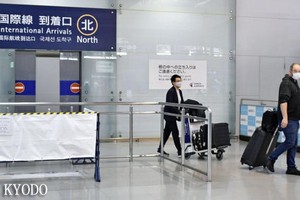 日本關西國際機場的國際達到口。（圖：共同社）