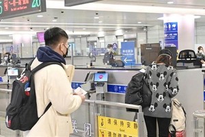 中國1月8日起取消入境核酸檢測。（圖：澎湃）