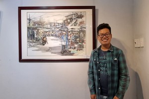 年轻画家张家俊和及其作品。