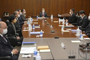 1月18日上午，日本央行货币政策会议在央行总部举行。（图：共同社）