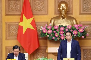 政府总理范明政主持会议。（图：VGP）