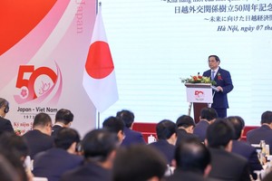 政府总理范明政出席研讨会并发表讲话。（图：越通社）