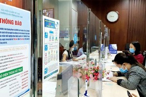 劳工到社保机关办理相关手续。