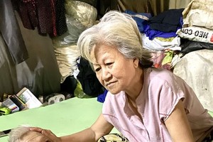 武氏民照顾余文康。