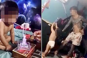 一名小男孩怀疑被长者强迫吸冰毒。此照片是从社交网站上所分享的一些视频剪贴下来(玉凯)