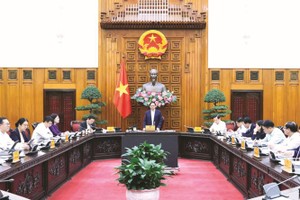 政府总理范明政主持会议。（图：VGP）