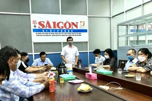 本报编辑部进行交流以提高业务水平。