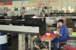 本市企业加快机械自动化进度。（图：市党部新闻网）