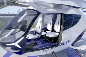 搭载3人的“空中飞行汽车”效果图。