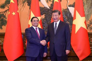 范明政总理会见中共中央总书记、中国国家主席习近平。（图：VGP）