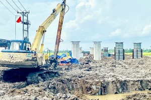 北南高速公路2021至2025年阶段东面工程建设项目所属的后江-金瓯路段成份项目的维水县61号国道立交桥施工场地。