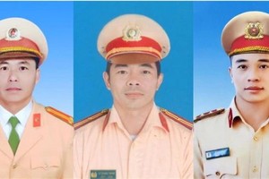 ３名殉职交警获追赠捍卫祖国勋章。左起依次为阮克常中校、黎光成少校和黎映创大尉。（图：公安部）