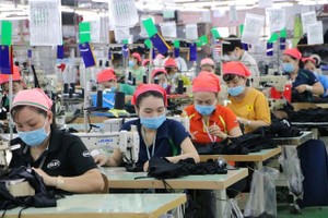 纺织品成衣生产线。（图：越通社）