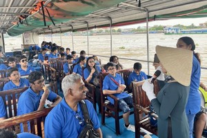 外国游客参观湄公河旅程。（图：Saigontourist）