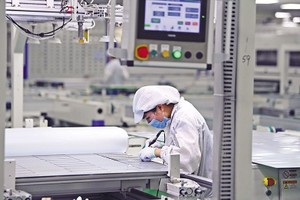 外国科技企业生产线。（图：投资报）