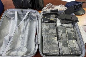 被查获的伪钞。（图：忠勇）