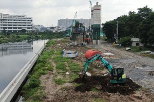 第十二郡新泰一坊38公顷安置区的参良-滨桔基建项目。（图：黄雄）