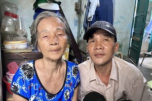 阮氏赖和儿子黎煌英。