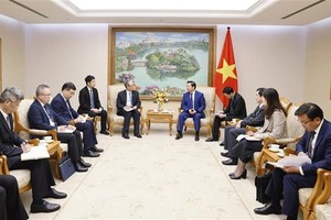 政府副总理陈红河会见中国电建集团领导。（图：越通社）