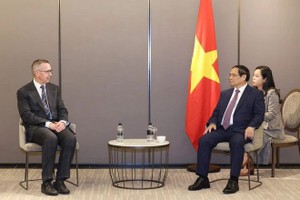 范明政总理接见新西兰中央银行主席兼怀卡托大学校长尼尔奎格利。（图：越通社）