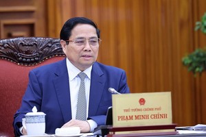 政府总理范明政主持会议。（图：越通社）