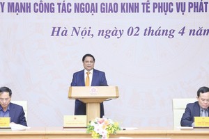 政府总理范明政在会上致辞。（图：越通社）