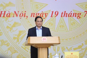 政府总理范明政会上致辞。（图：VGP）