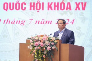 政府总理范明政在会议上致开幕词。（图：VGP）