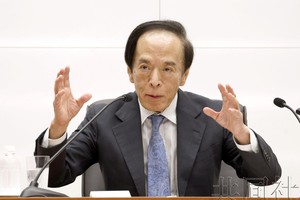 7月31日下午，日本央行的货币政策会议决定加息，行长植田和男召开记者会。（图：共同社）