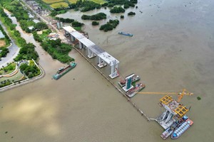 合龙前的仁泽桥一隅。（图：黄北）