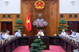 政府总理范明政主持会议。（图：VGP）