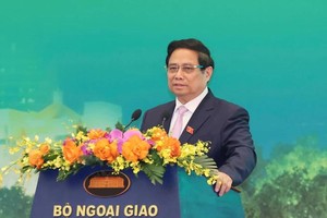 政府总理范明政在会议上致辞。（图：光福）