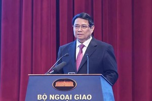 政府总理范明政在会议上发表讲话。（图：曰钟）