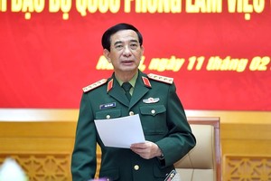 国防部长潘文江大将在会议上发言。（图：人民军队报）