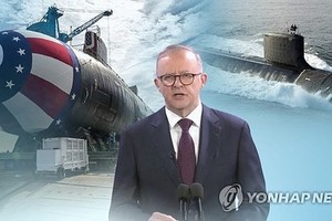 朝中社20日发表评论谴责澳大利亚计划从美国引进核潜艇。（资料图片：韩联社/韩联社TV供图）