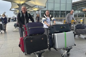 图为旅客抵达伦敦希思罗机场 5 号航站楼。（图：AP）