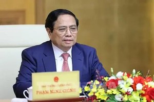 政府总理范明政。