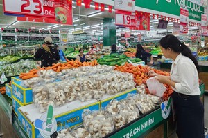 参加“责任绿色勾号”计划的许多产品在超市系统上架。